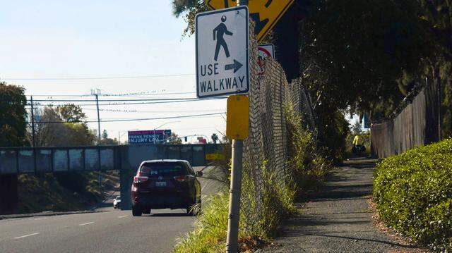 A cyclist uses the walkway to cross Watt Avenue at the railroad tracks near Roseville Road in North Highlands, Calif., on Sunday, March 15, 2026. The underpass is among dozens of Northern California pedestrian and bike safety projects that went unfunded in the state’s 2024 Active Transportation Program grant cycle despite high demand and documented crash risks along the Watt Avenue corridor.